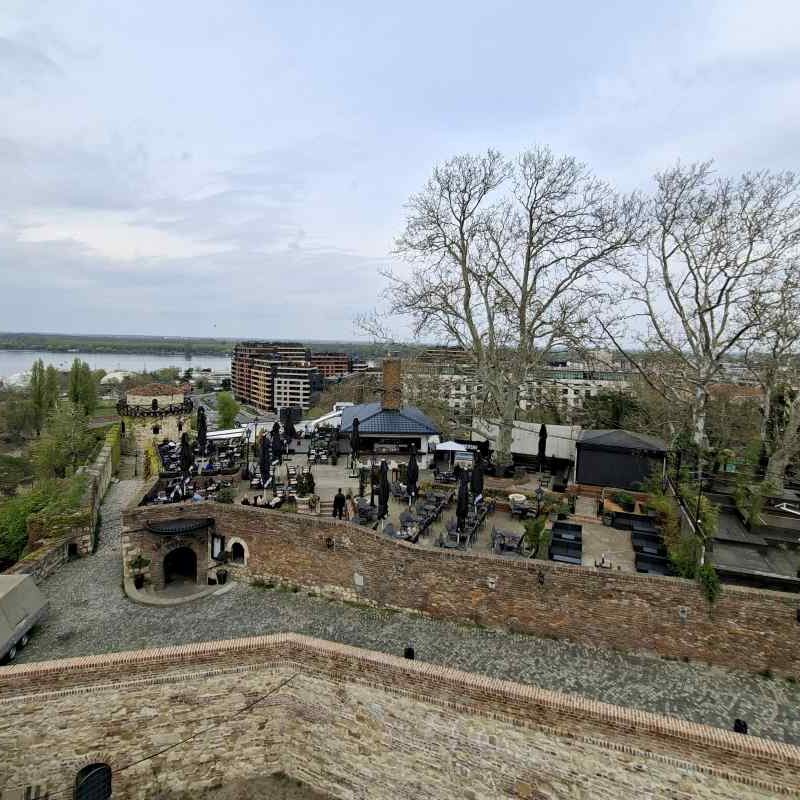 View of Kalemegdanska terasa restaurant from the fortress with the Sava–Danube confluence in the background