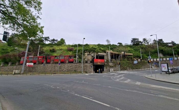 Konoba Akustik Kalemegdan in central Belgrade with a tram passing through Pariska Street