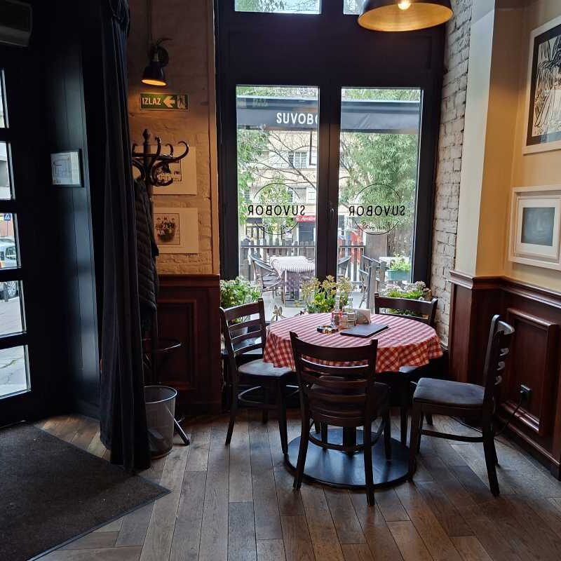 Table by the window at Suvobor restaurant in Belgrade Old Town
