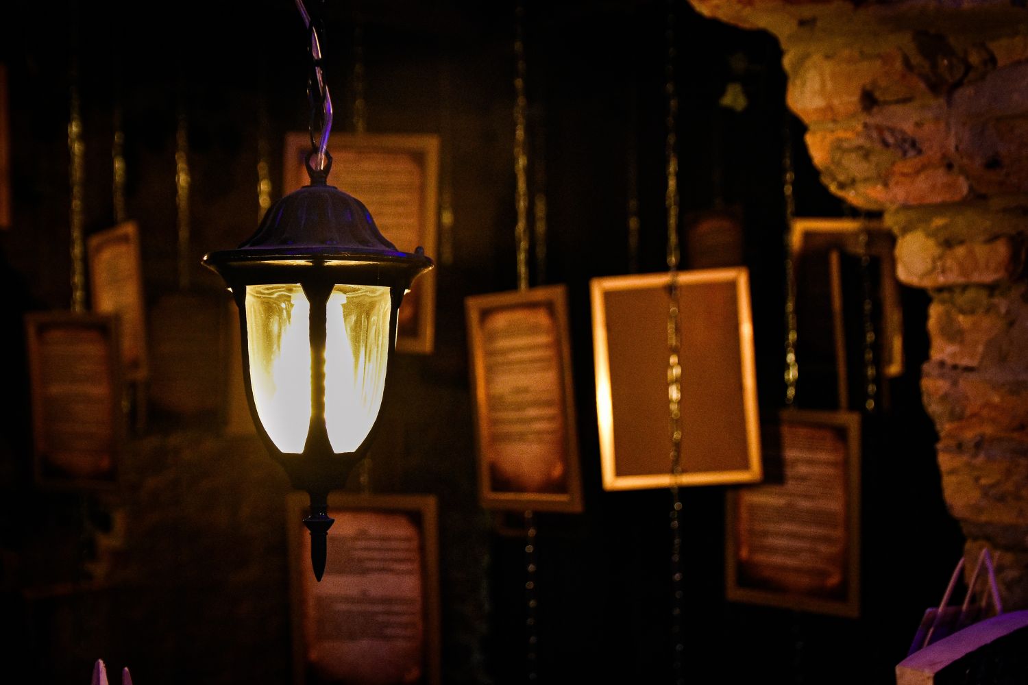 Mysterious Atmosphere of the Paranormal Museum Vintage lantern and hanging information panels inside the Paranormal Museum