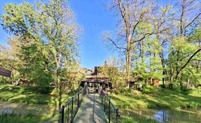 Wooden bridge leading to Zabranska Bajka in Obrenovac